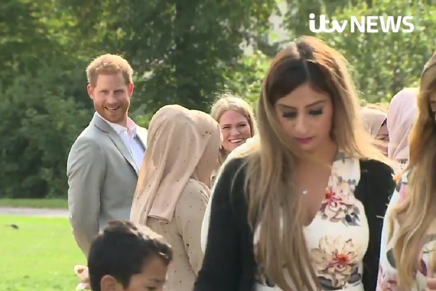 Caught on camera: Prince Harry sneaks a samosa (Video)