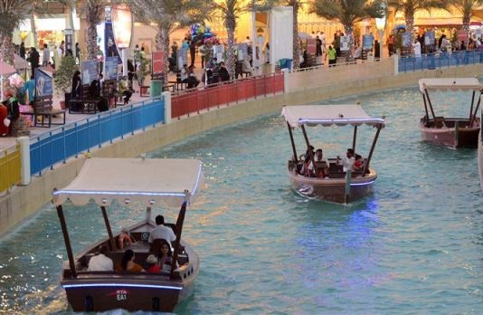 Sail on an electric abra at Dubai’s Global Village!
