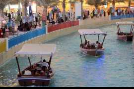 Sail on an electric abra at Dubai’s Global Village!